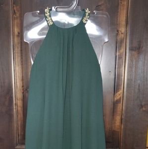 Green dress with embellished neckline